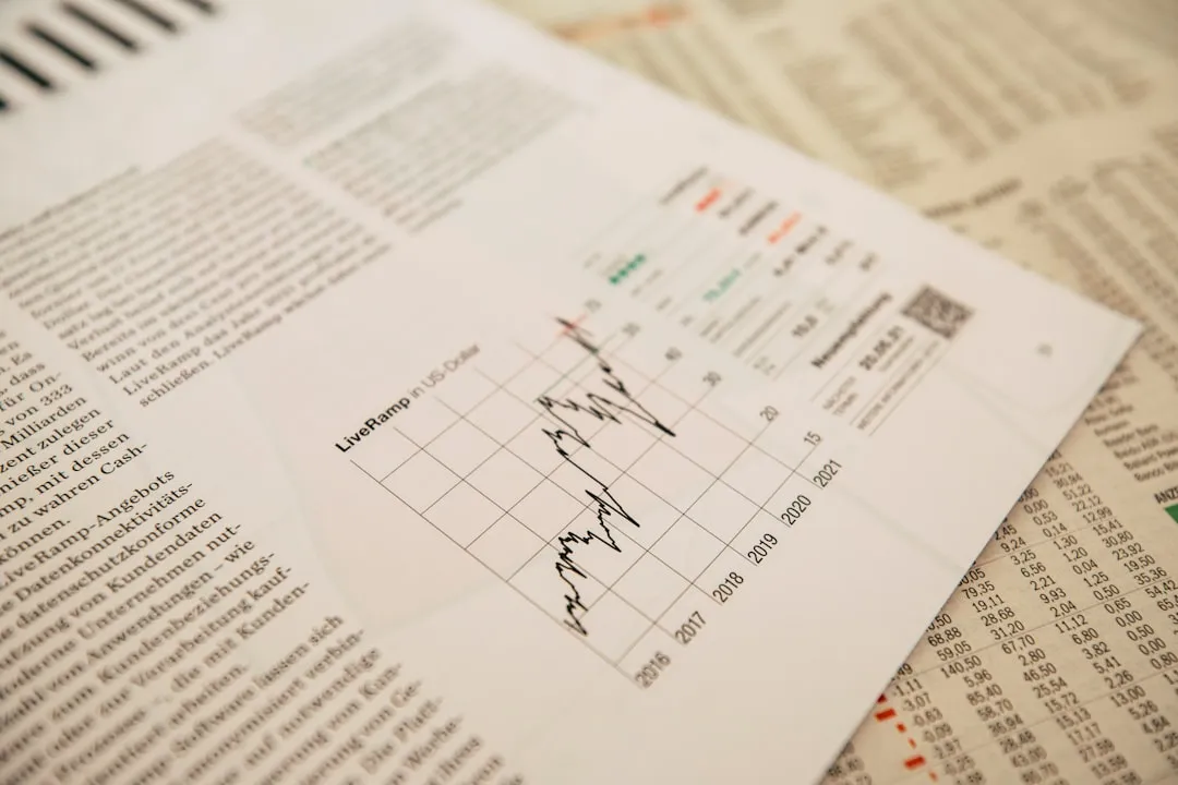 A magnifying glass over a financial chart, symbolizing an operational audit